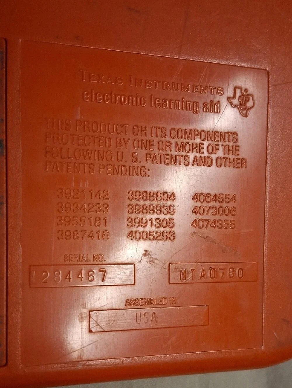 Texas Instruments Orange and Yellow Speak & Spell Handheld Learning Console